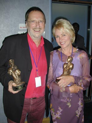 Denny Doherty and Michele Phillips of The Mama's and The Papa's with their Harmony Awards.